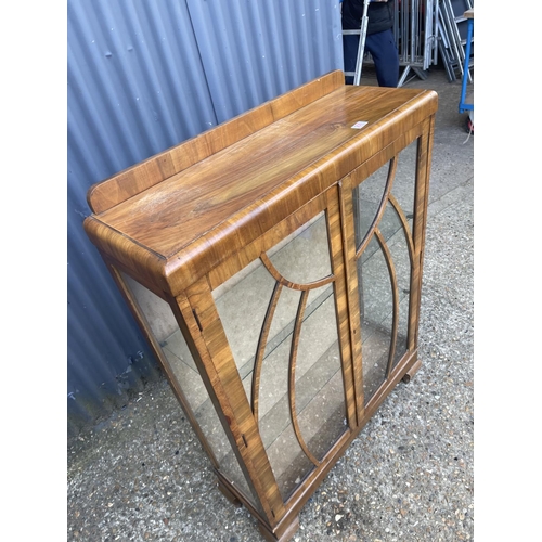 231 - A deco style walnut display cabinet with two glass shelves 90x30x122