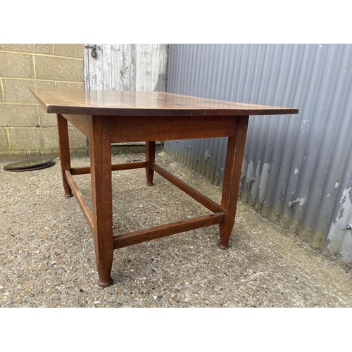 237 - An arts and crafts oak refectory style dining table 137x99x76