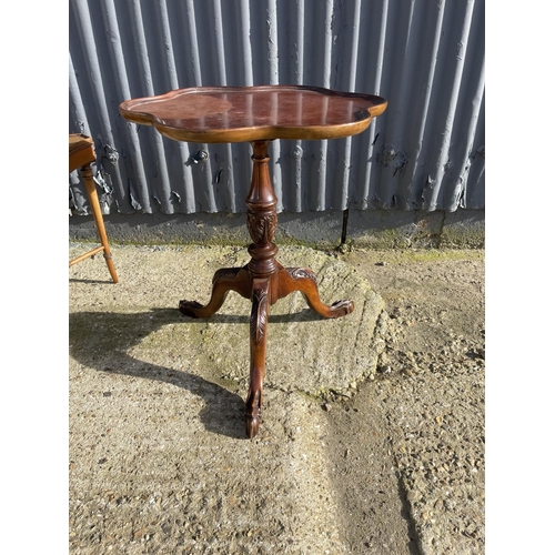 245 - Reproduction tripod table together with a yew coffee table