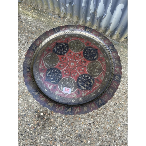 246 - A brass tray top table with folding base