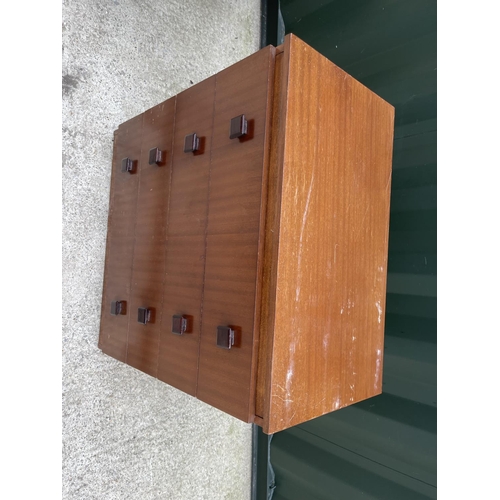 259 - A mid century teak chest of four drawers