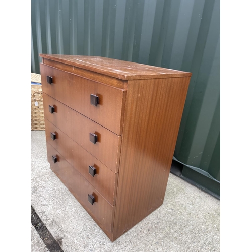 259 - A mid century teak chest of four drawers