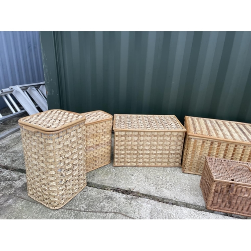 261 - A collection of seven wicker linen boxes