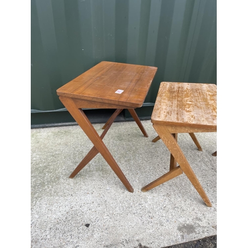 267 - A danish style teak nest of three tables