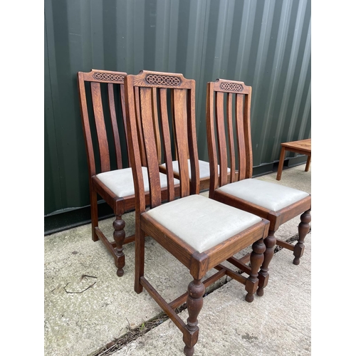 272 - A set of four 1920's oak dining chairs