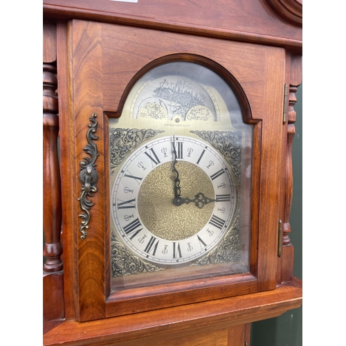 279 - A reproduction long-case clock by emperor clock co with weights and pendulum