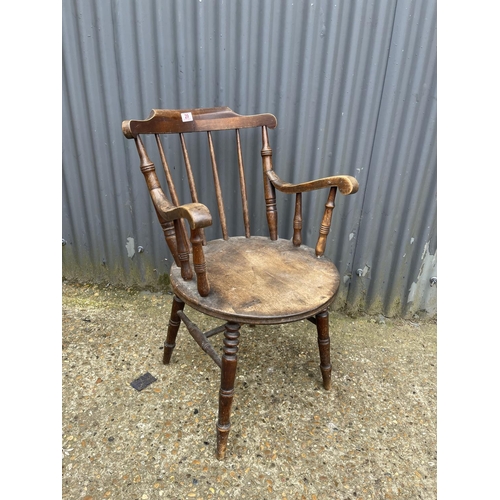 29 - A Windsor style stick back carver chair