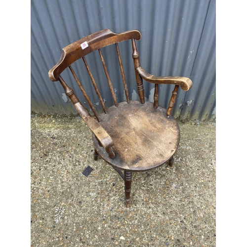 29 - A Windsor style stick back carver chair