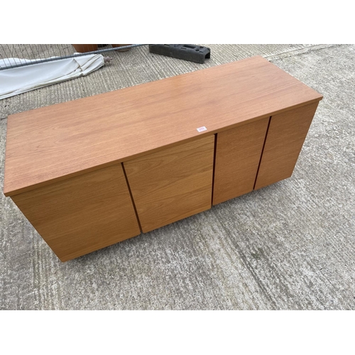 292 - A two section teak unit by SKOBY with a single teak top