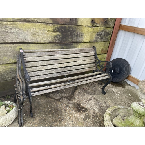 346 - An iron framed garden bench together with additional bench ends