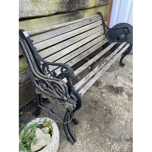 346 - An iron framed garden bench together with additional bench ends