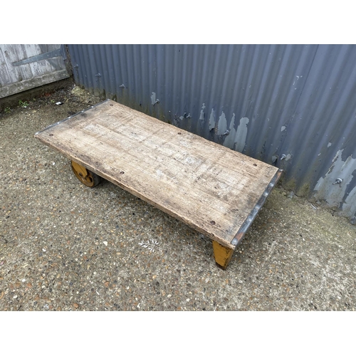 39 - An upcycled vintage market barrow coffee table 120x 57x 30