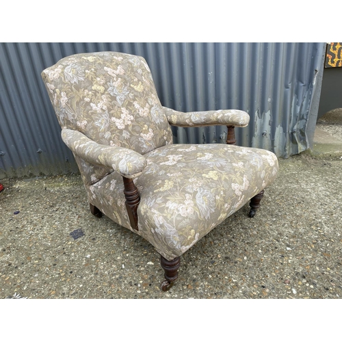 4 - An edwardian oak framed armchair