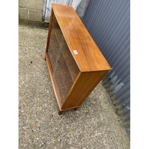 42 - A mid century glazed bookcase with adjustable shelves 99x28x88