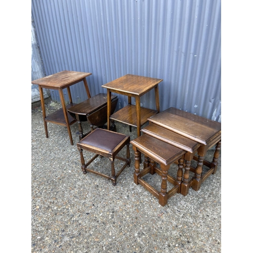 44 - AN  oak nest of three, two oak tables, stool and drop leaf table