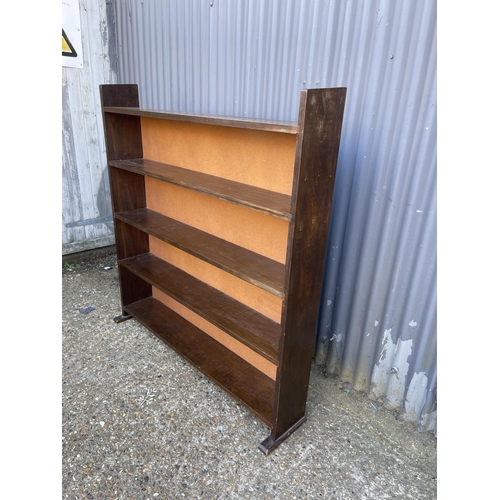 46 - An oak open fronted bookcase 125x20x135