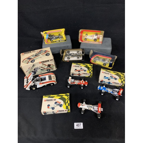 407 - Polistil boxed Lola, 7 other boxed model racing cars