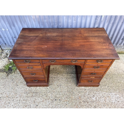 302 - An Edwardian mahogany desk 120x52x 75