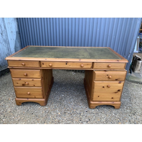 307 - Pine twin pedestal desk, with leather top, length 153cms, height 73cms, depth 78cms