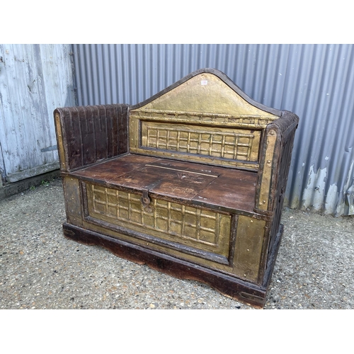 308 - An eastern style brass overlaid blanket box bench seat 122x67x120. VERY HEAVY.