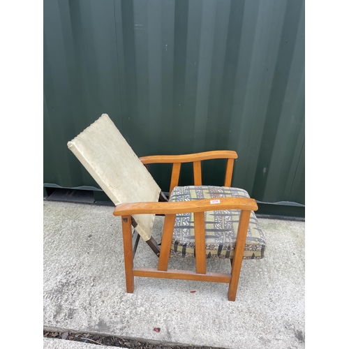 312 - A mid century reclining easy chair