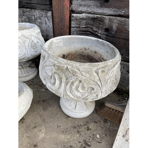 316 - A pair of concrete pedestal urns together with log effect trough