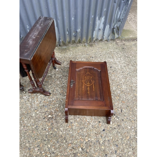 11 - A rosewood chair, inlaid wall cupboard and Sutherland table