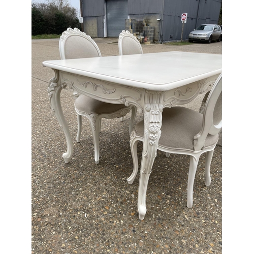 110 - A french style white painted dining table with four chairs 174x 94