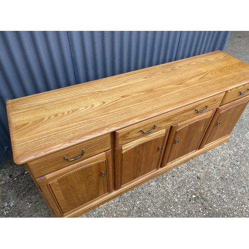 118 - A larger light oak modern 180x50x80 sideboard