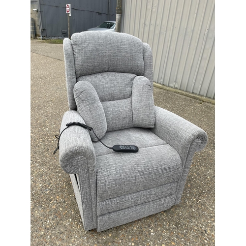 126 - A modern grey upholstered electric rise and recline armchair