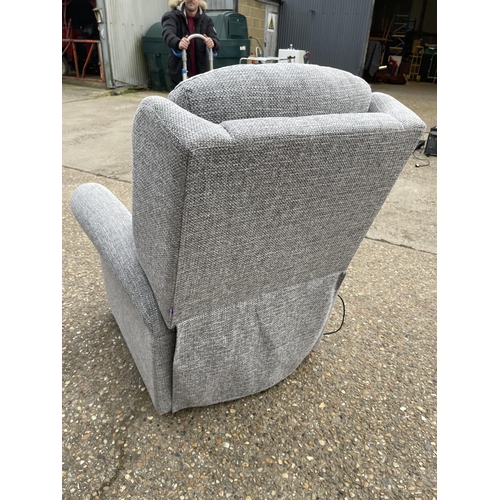 126 - A modern grey upholstered electric rise and recline armchair