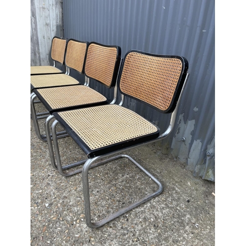 128 - A set of four retro Italian begere and chrome cantilever chairs