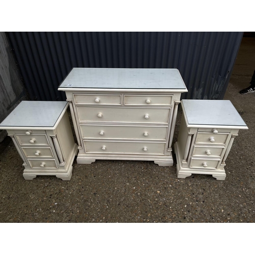 138 - A french style white painted chest of five drawers together with pair of matching three drawer bedsi... 