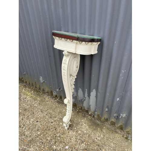 14 - An ornate white painted mahogany hall table