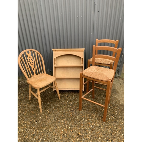 182 - Pine wall shelves, wheelbacked chair and 2 rush seat bar stools