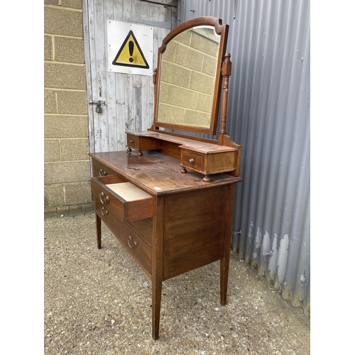 21 - An Edwardian mahogany dressing table with satinwood inlay