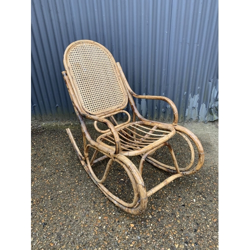 212 - Vintage cane rocking chair, back height 103cms