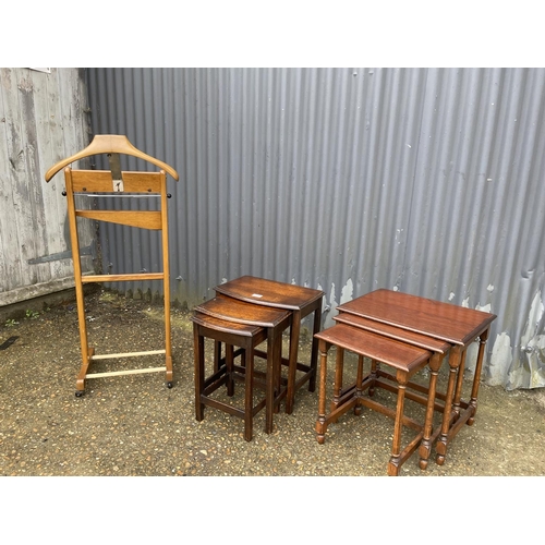 219 - Two oak nests of three tables and a valet stand