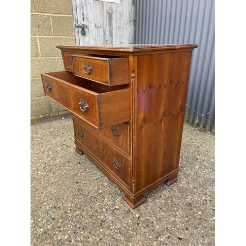 22 - A reproduction yew wood chest of five drawers 92x45x 104