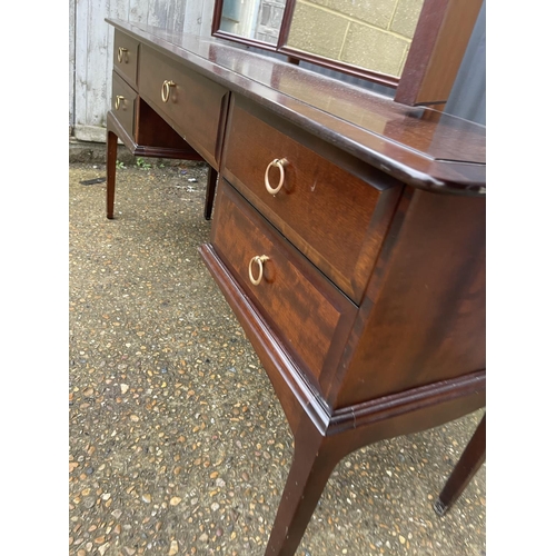 221 - A Stag minstrel kneehole dressing table