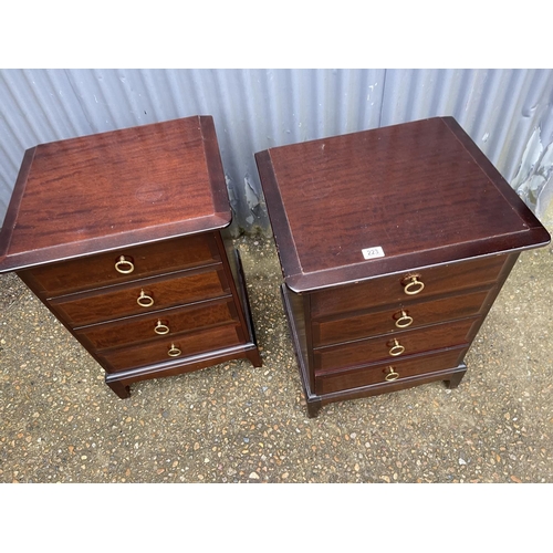 223 - A pair of stag minstrel four drawer bedsides