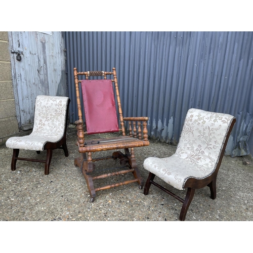 241 - An American style spring rocker chair for restoration together with a pair of mahogany chairs