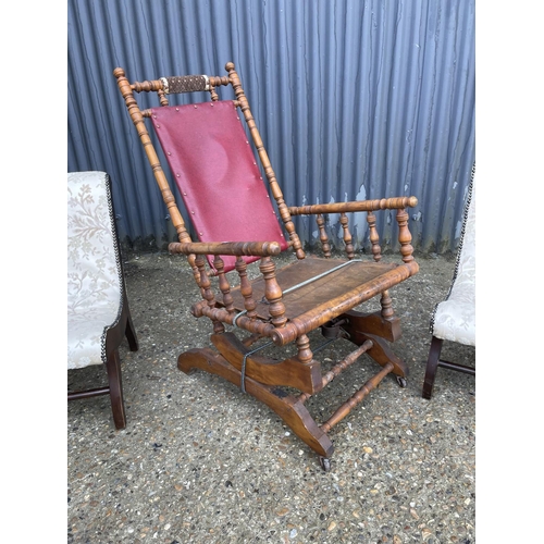 241 - An American style spring rocker chair for restoration together with a pair of mahogany chairs