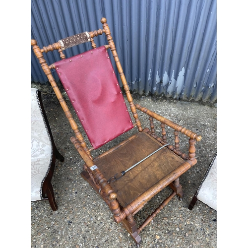 241 - An American style spring rocker chair for restoration together with a pair of mahogany chairs