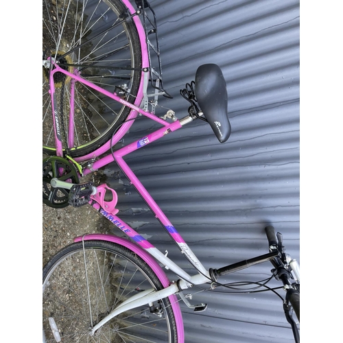 250 - A pink ladies cycle with helmet, bag, jacket and pump