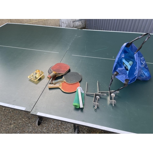 252 - A large Dunlop fold down table tennis table  with bats, balls and net