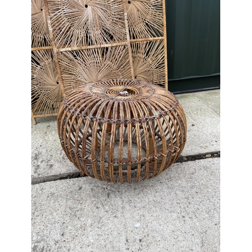 287 - A bamboo footstool together with three wicker screen panels