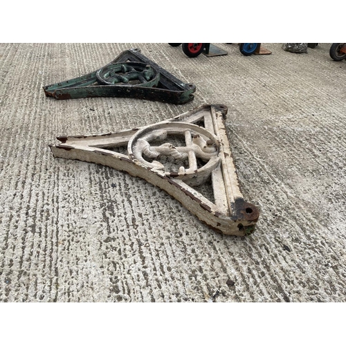 326 - A pair of heavy iron pieces, removed from a industrial building in Tilbury Docks, Essex  74x 77cm