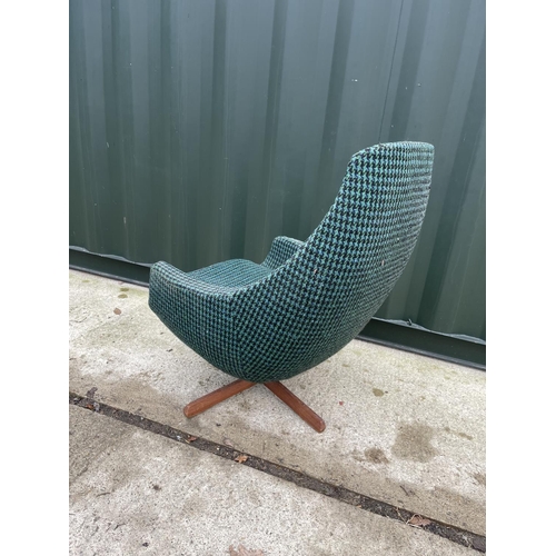 342 - A retro green pattern swivel Egg chair on teak base