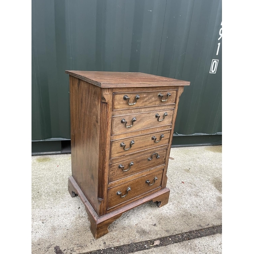 345 - A small reproduction mahogany chest of five drawers